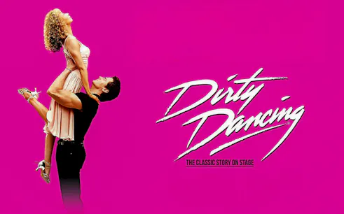 Couple performing iconic lift from Dirty Dancing stage show.