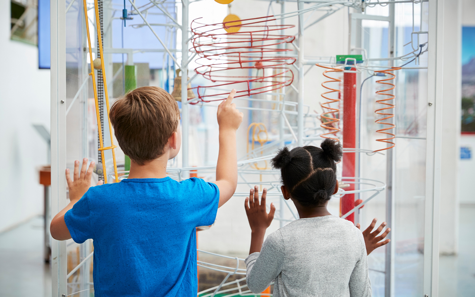 NEMO Science Museum rooftop with people enjoying panoramic views of Amsterdam.
