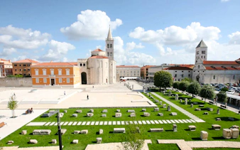 Historic Zadar square with St. Donatus Church and Roman ruins, Croatia.