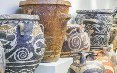 Ancient pottery with spiral designs in Archaeological Museum of Heraklion, Crete, Greece.