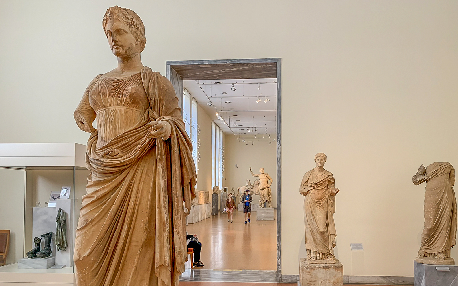 Exhibits of ancient statues inside the National Archaeological Museum.