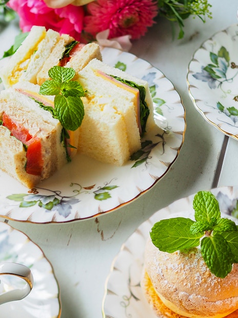 Afternoon tea with sandwiches and pastries at the British Museum.