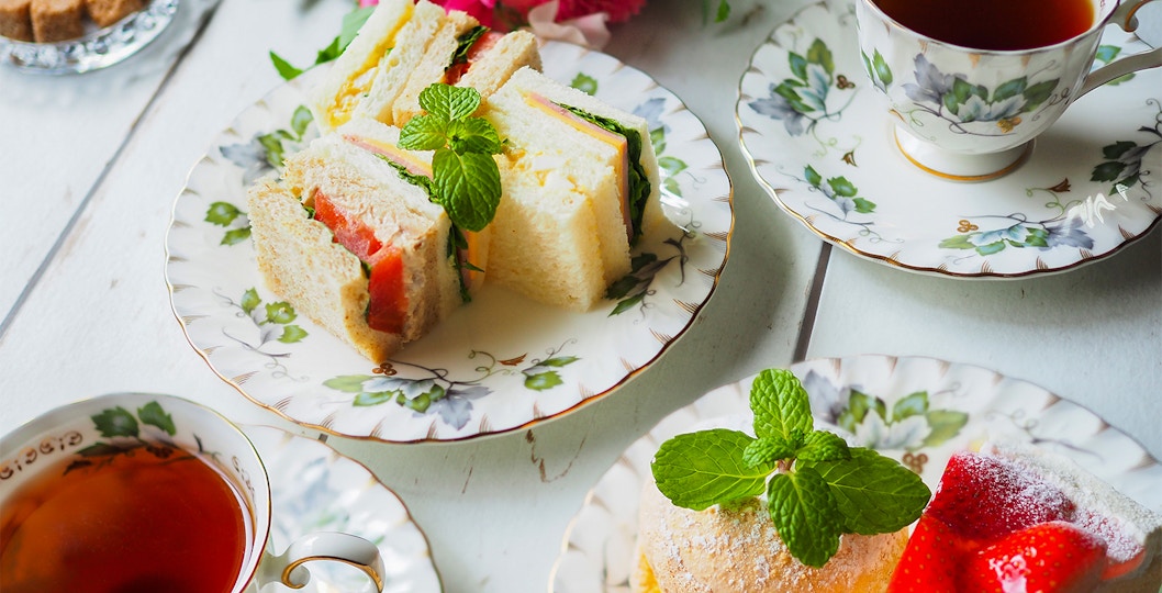Afternoon tea with sandwiches and pastries at the British Museum.