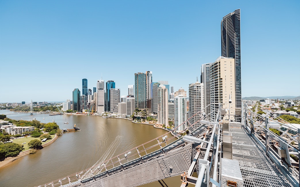 Brisbane city skyline and river viewed from Story Bridge Adventure Climb walkway.