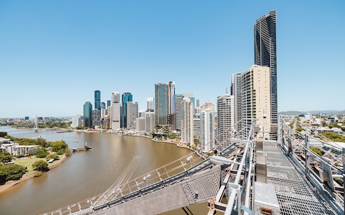 Brisbane city skyline and river viewed from Story Bridge Adventure Climb walkway.