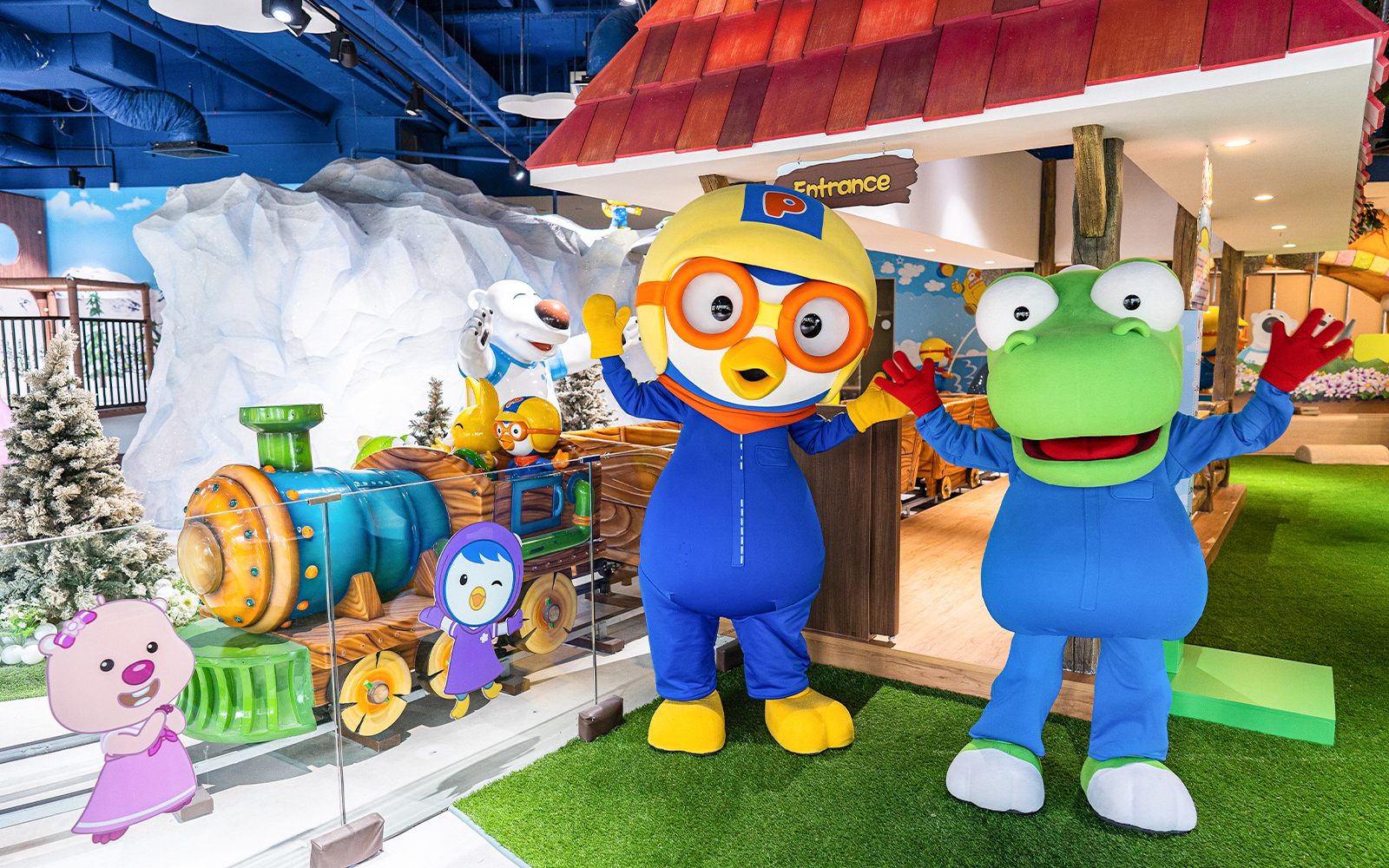Pororo and friends at Pororo Park Singapore with colorful train and snowy backdrop.