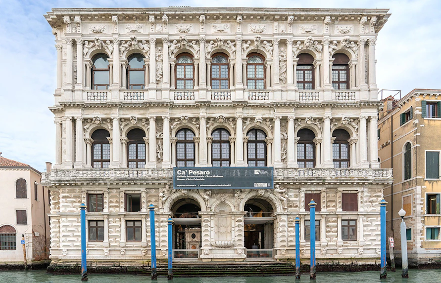 Ca Pesaro baroque marble palace on Grand Canal, Venice, in summer.