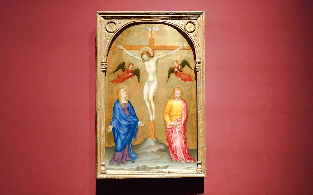 Crucifixion painting by Gentile da Fabriano at Pinacoteca di Brera, featuring Jesus on the cross.