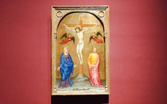 Crucifixion painting by Gentile da Fabriano at Pinacoteca di Brera, featuring Jesus on the cross.