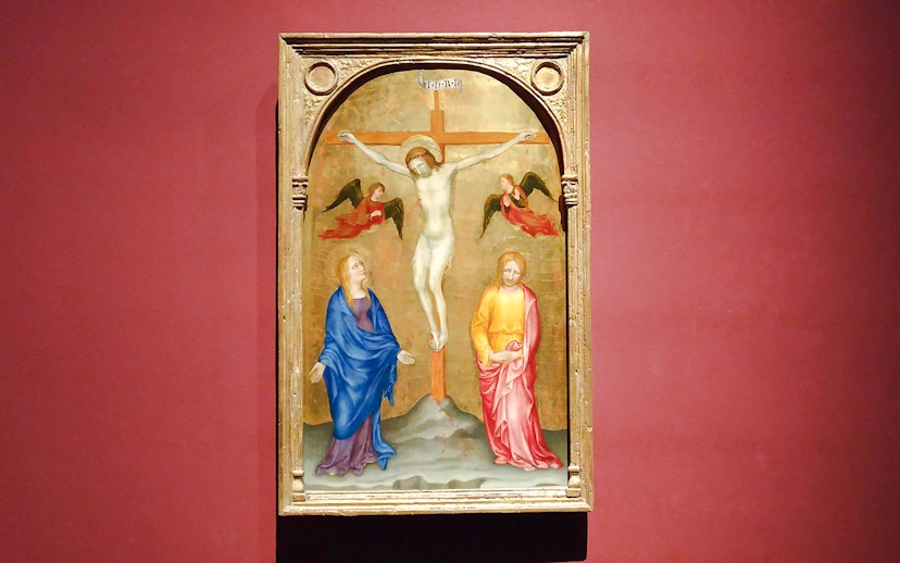 Crucifixion painting by Gentile da Fabriano at Pinacoteca di Brera, featuring Jesus on the cross.