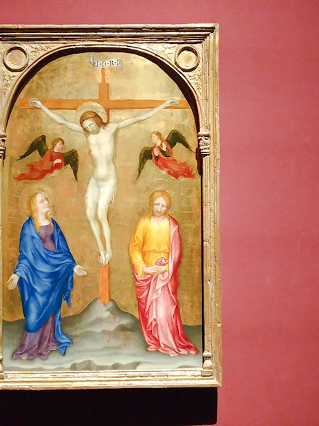 Crucifixion painting by Gentile da Fabriano at Pinacoteca di Brera, featuring Jesus on the cross.