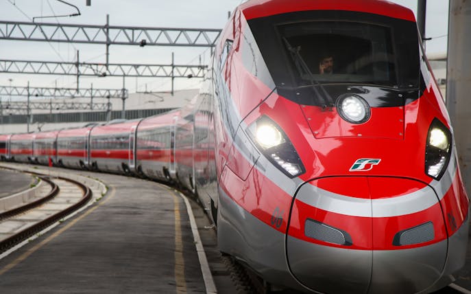 High-speed train at an Italian station for 7-Day Italy Train Pass journey.
