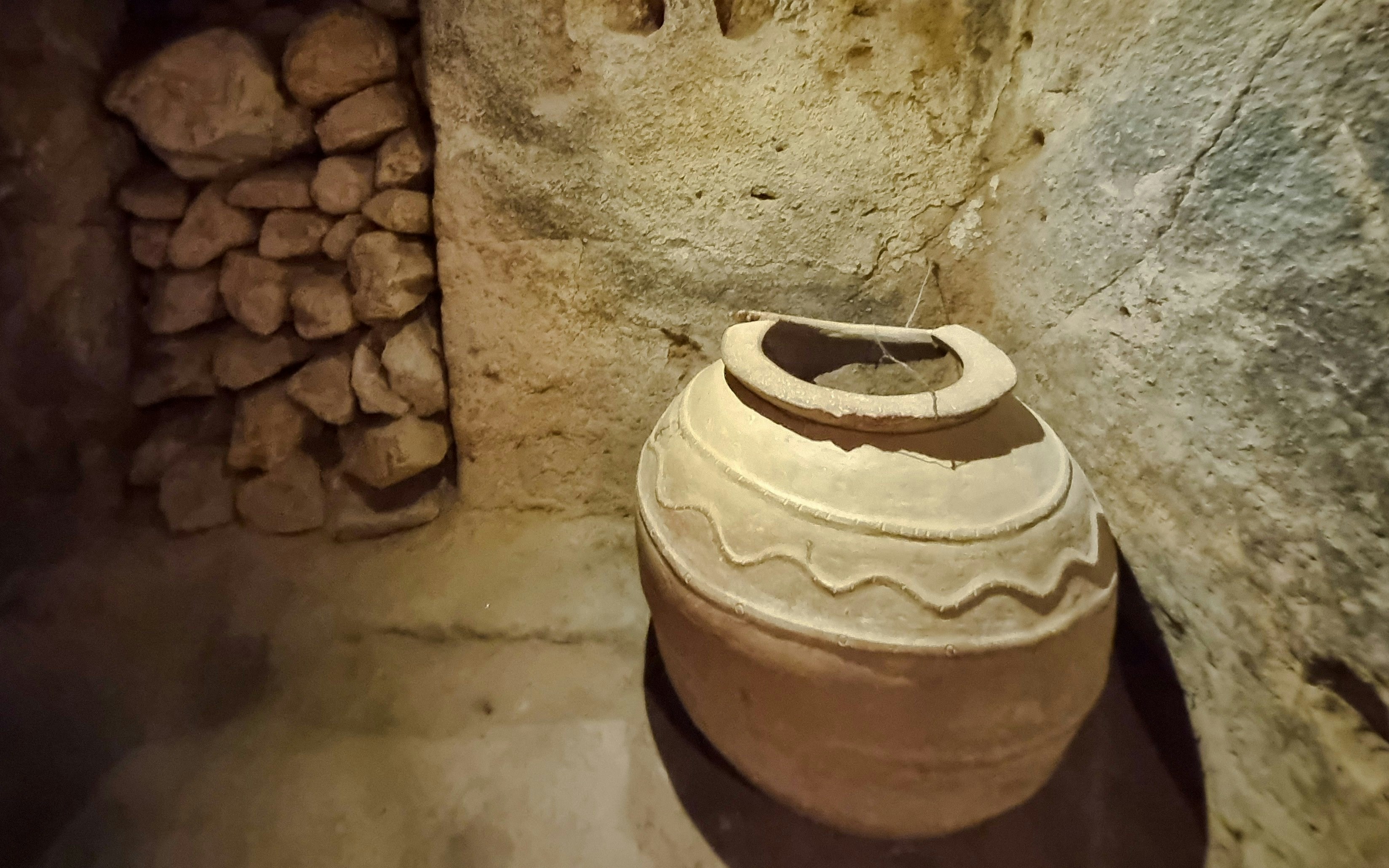 Ancient clay pot in Ozkonak underground city, Cappadocia, Turkey.