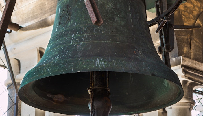 Bells of Mark’s Bell Tower in Venice, Italy, with intricate architectural details.