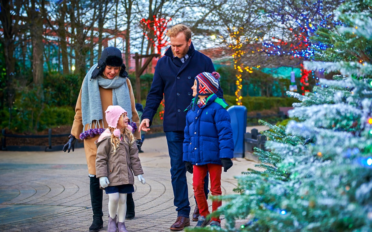 Family enjoying Christmas decorations at Legoland London.