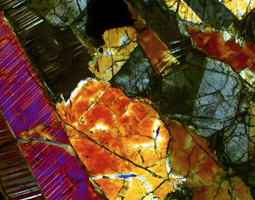 Earth and Planetary Sciences exhibit at a museum featuring meteorites and geological samples.