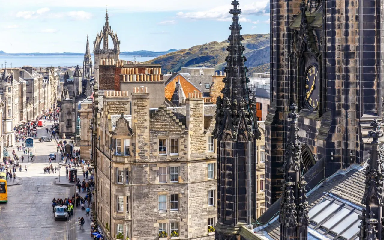 Edinburgh cityscape with historic buildings and St Giles' Cathedral spire.