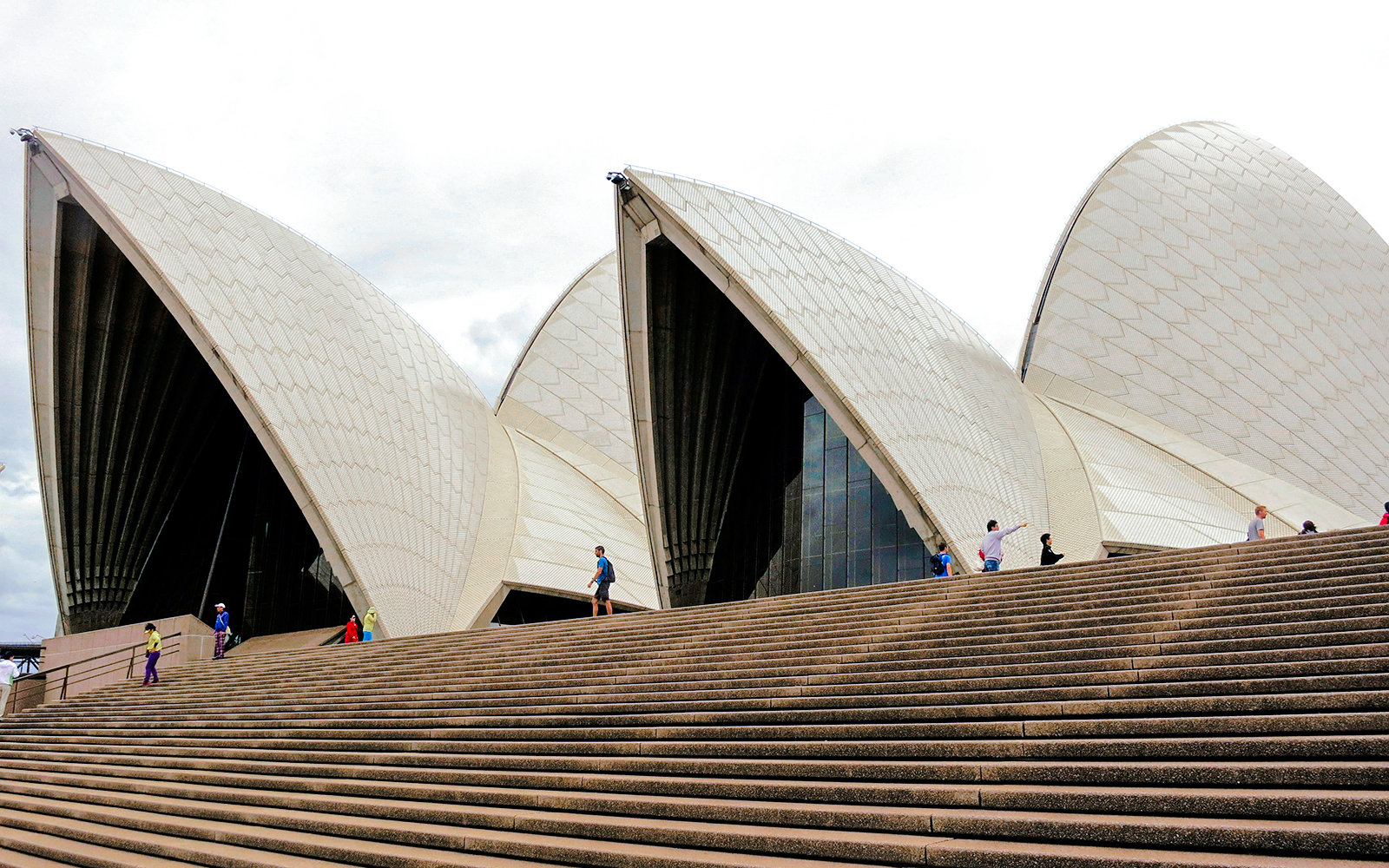 Sydney Opera House sails with visitors on the steps, Australia.