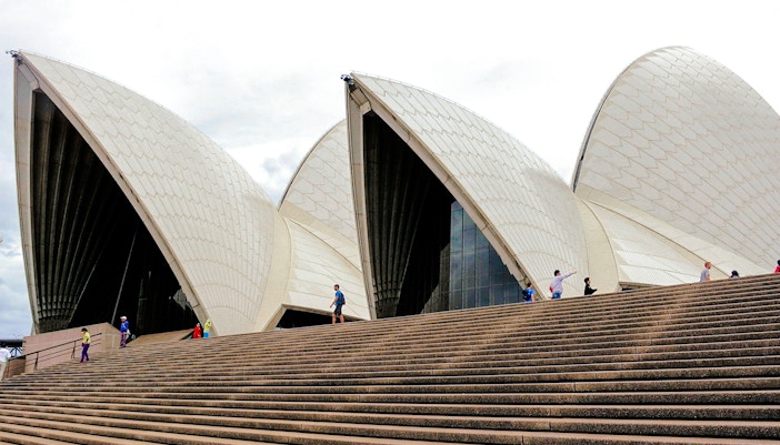 Sydney Opera House sails with visitors on the steps, Australia.