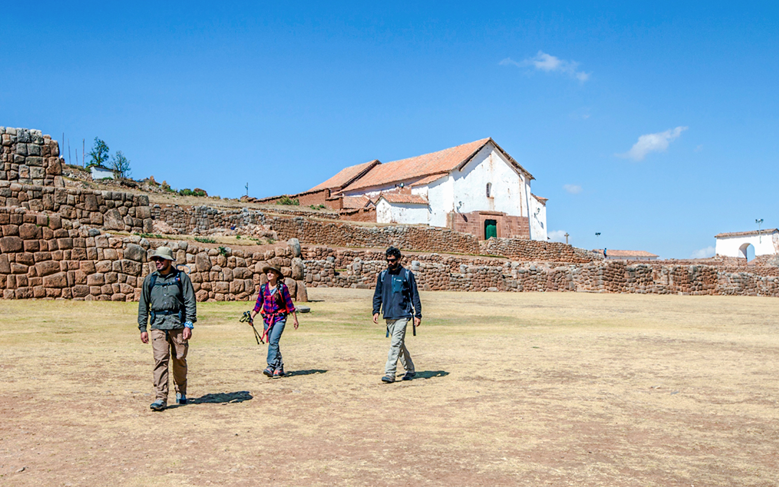 Visitors walking at Chinchero Archaeological Park, Sacred Valley of the Incas, Peru.