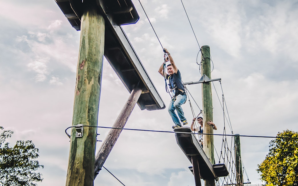 Person ziplining at Mega Adventure Park, Singapore.