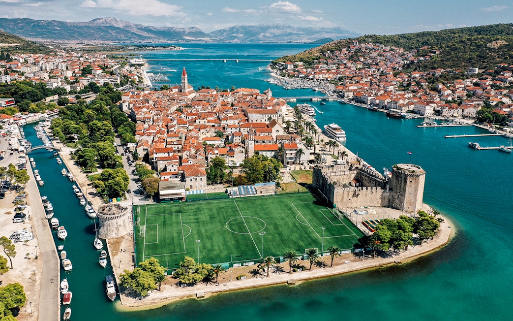Aerial view of Trogir's historic center and waterfront near Split, Croatia.