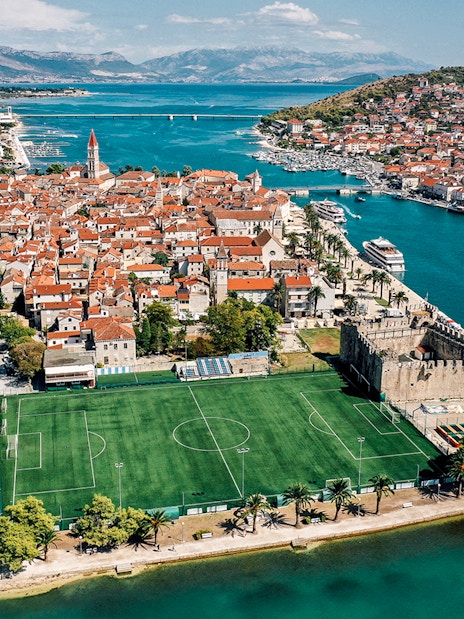 Aerial view of Trogir's historic center and waterfront near Split, Croatia.