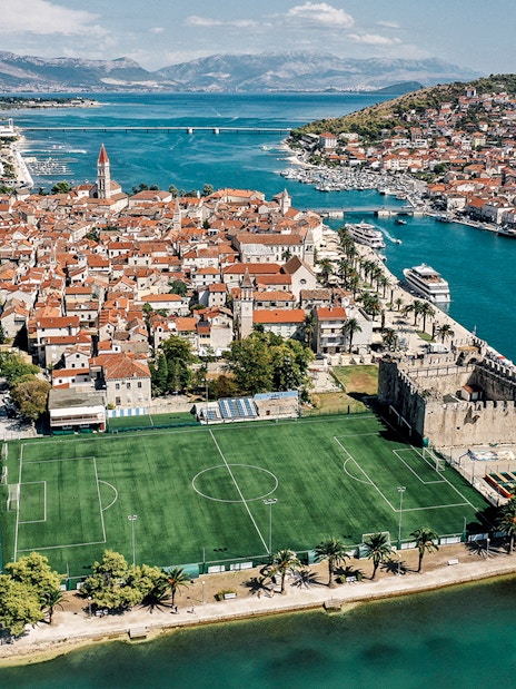 Aerial view of Trogir's historic center and waterfront near Split, Croatia.