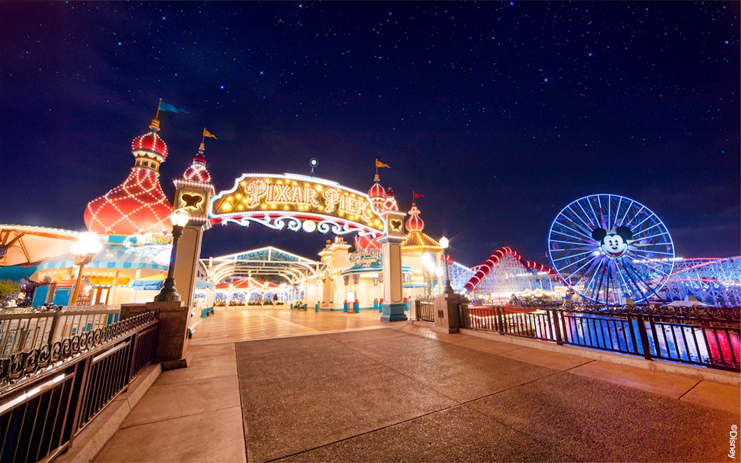 Pixar Pier entrance and Mickey Ferris wheel at Disneyland Adventure Park, California.