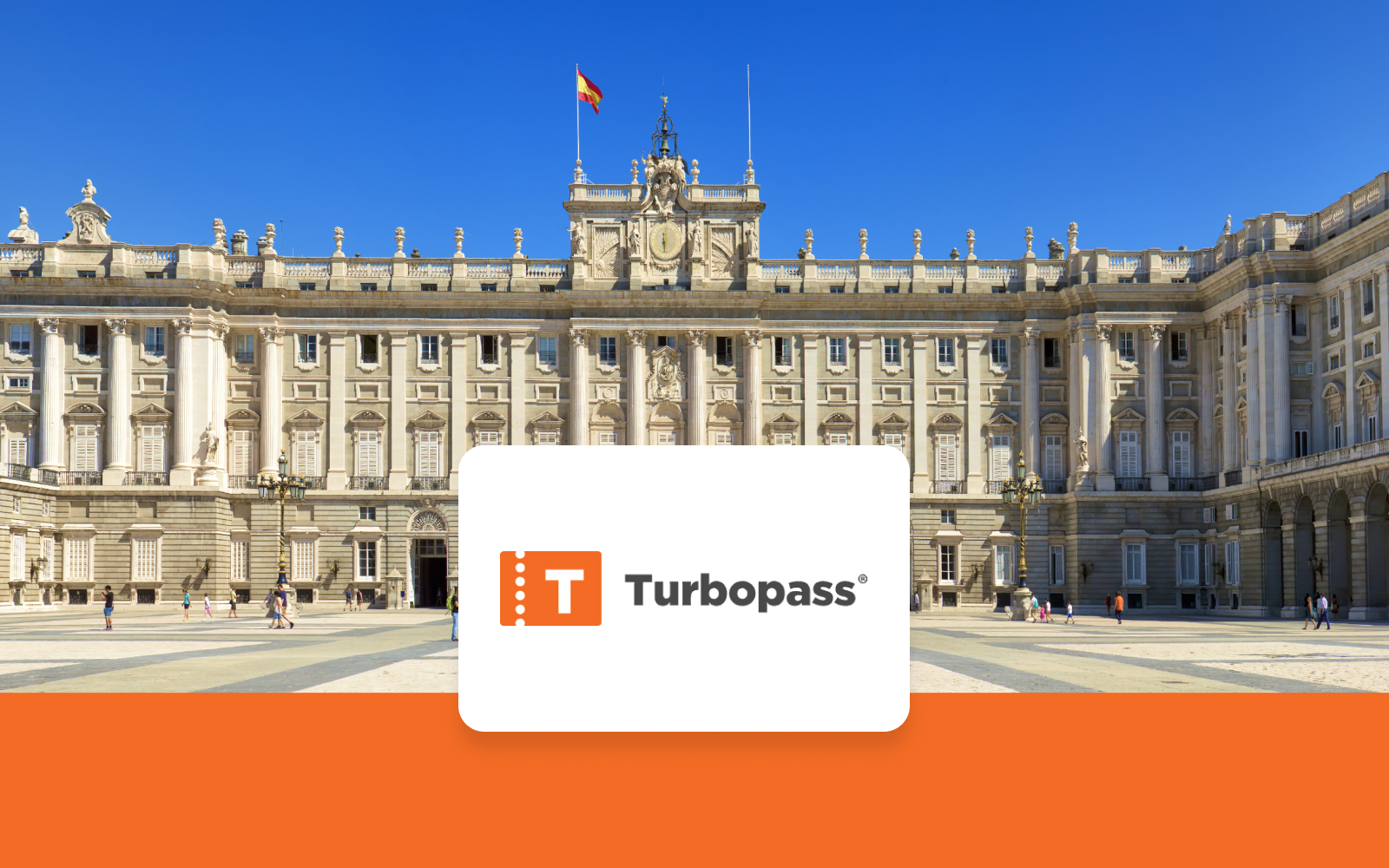 Royal Palace of Madrid facade with visitors in the courtyard.