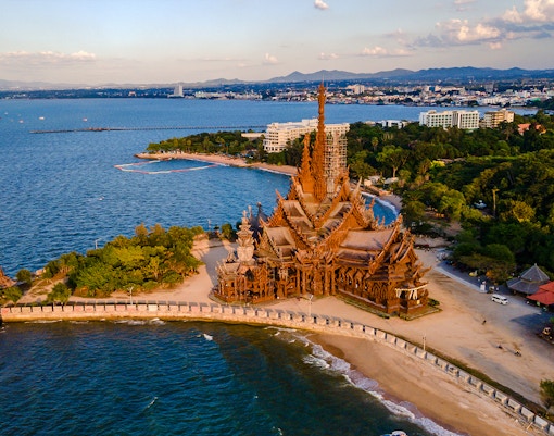Sanctuary of Truth wooden temple in Pattaya, Thailand, aerial view at sunset.