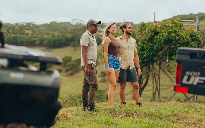 Group enjoying scenic view on Bel Ombre quad bike tour.