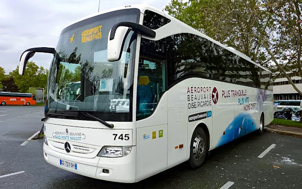 Shuttle bus for Paris Beauvais Airport transfer service.