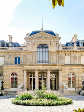 Jacquemart André Museum facade with columns and statues in Paris.