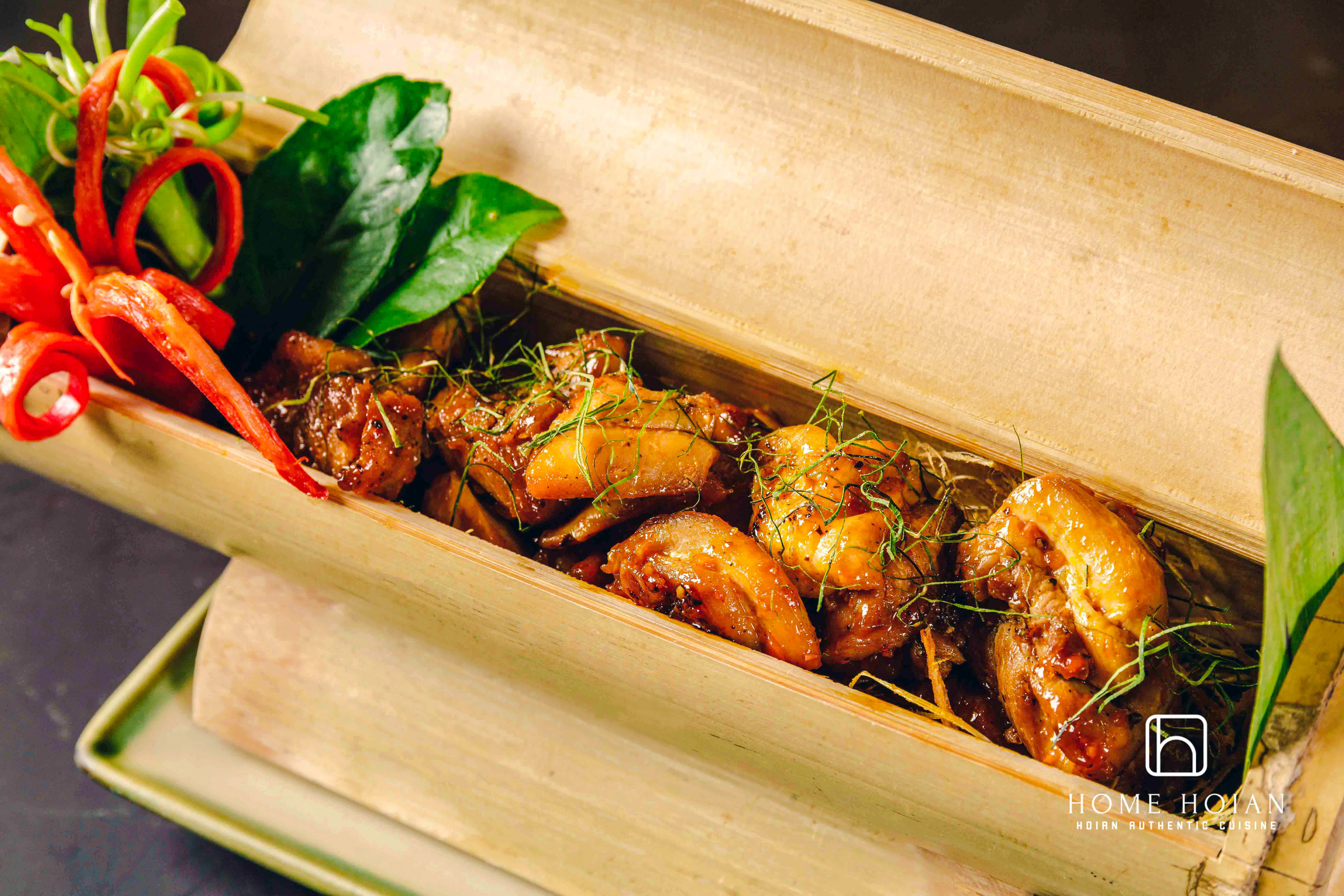 Vietnamese dish in bamboo box at HOME Hoi An Restaurant, Hoi An.