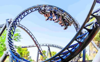 Batman Gotham City Escape roller coaster loop at Parque Warner Madrid.