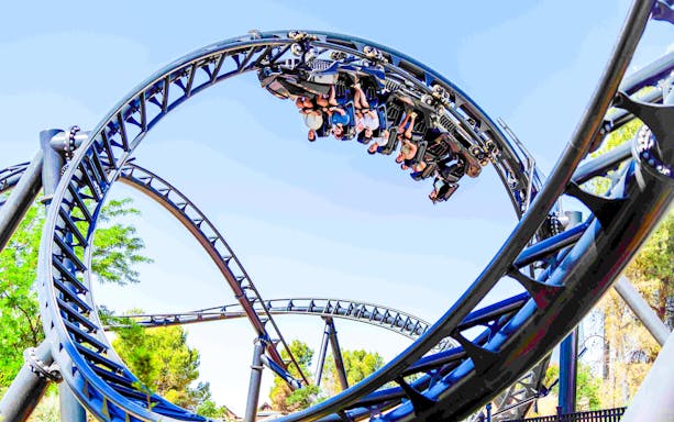 Batman Gotham City Escape roller coaster loop at Parque Warner Madrid.