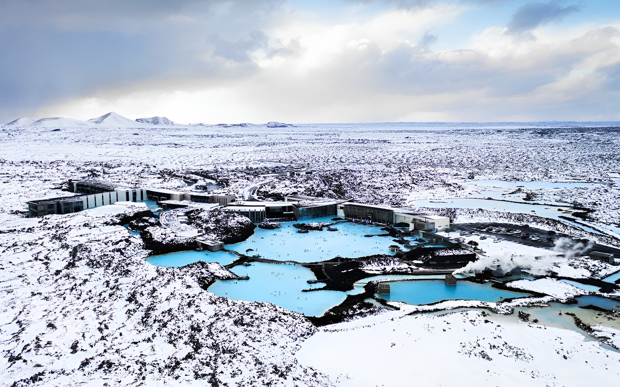 Blue Lagoon geothermal spa surrounded by snow near Reykjavík, Iceland.