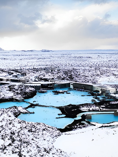 Blue Lagoon geothermal spa surrounded by snow near Reykjavík, Iceland.