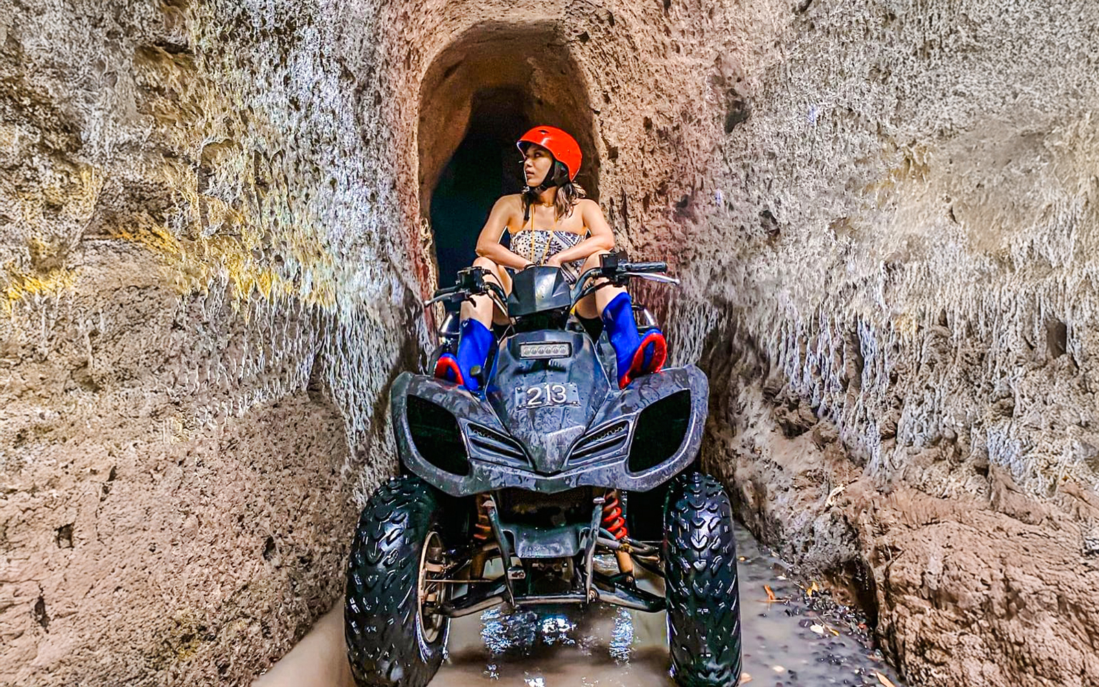 ATV navigating through Kuber's long tunnel.