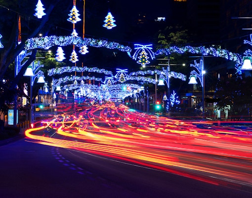 Orchard Road adorned with festive Christmas lights and decorations in Singapore.