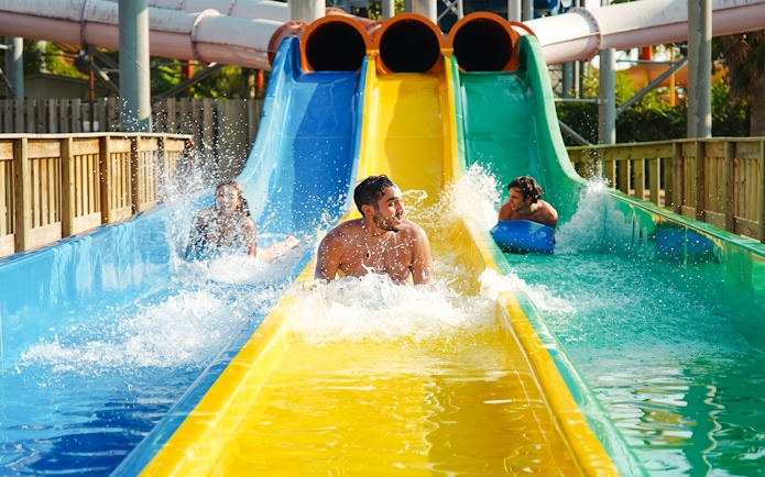 Visitors enjoying water slides at Aquasplash Antibes.