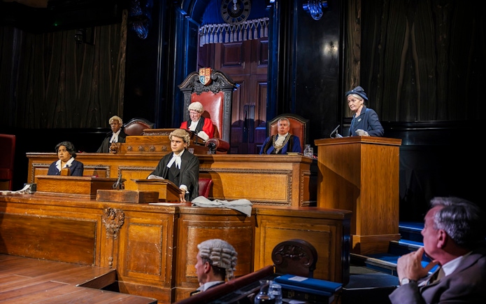 Stage scene from "Witness for the Prosecution" in West End courtroom setting.