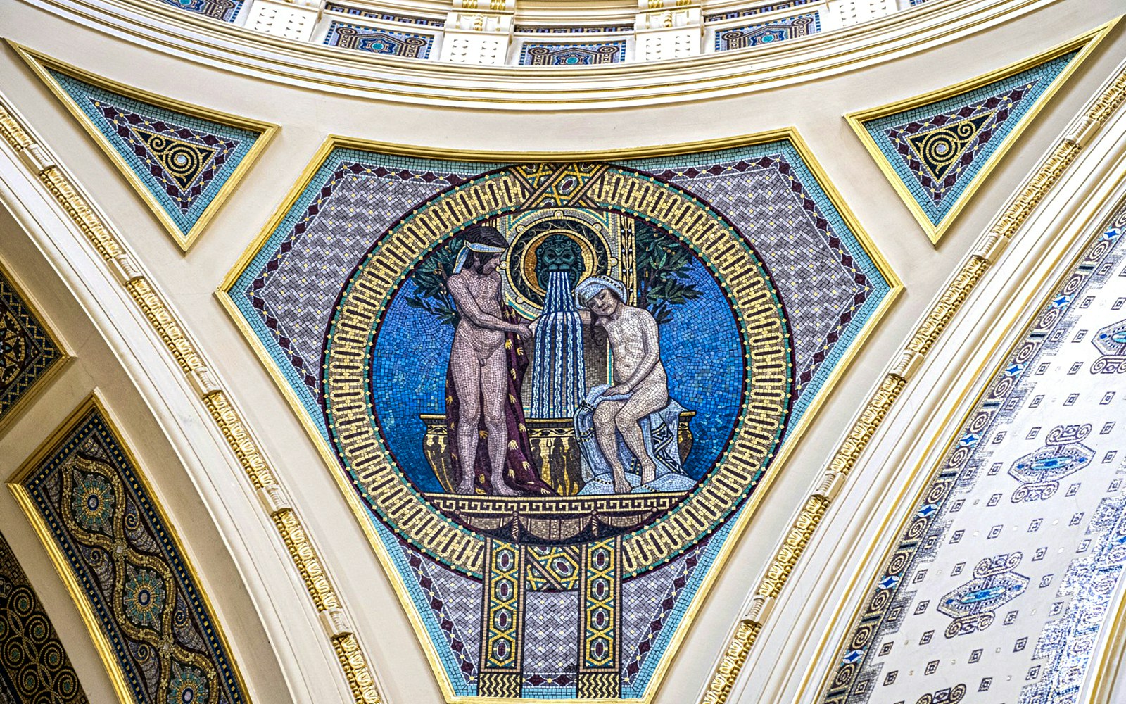 Széchenyi Spa intricate wall details with classical motifs in Budapest, Hungary.