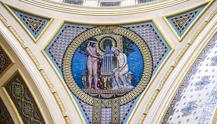 Széchenyi Spa intricate wall details with classical motifs in Budapest, Hungary.