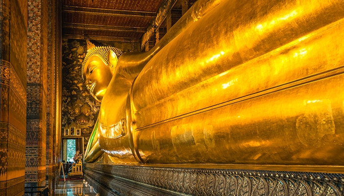 The reclining Buddha inside Wat Pho temple.