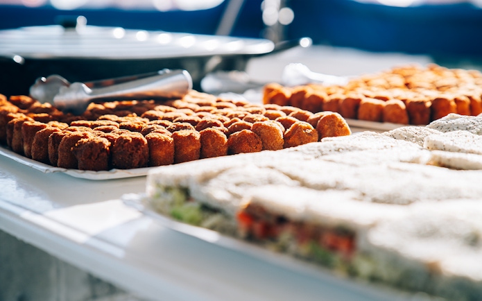 Snacks on a tray aboard Lanzarote sunset boat tour.