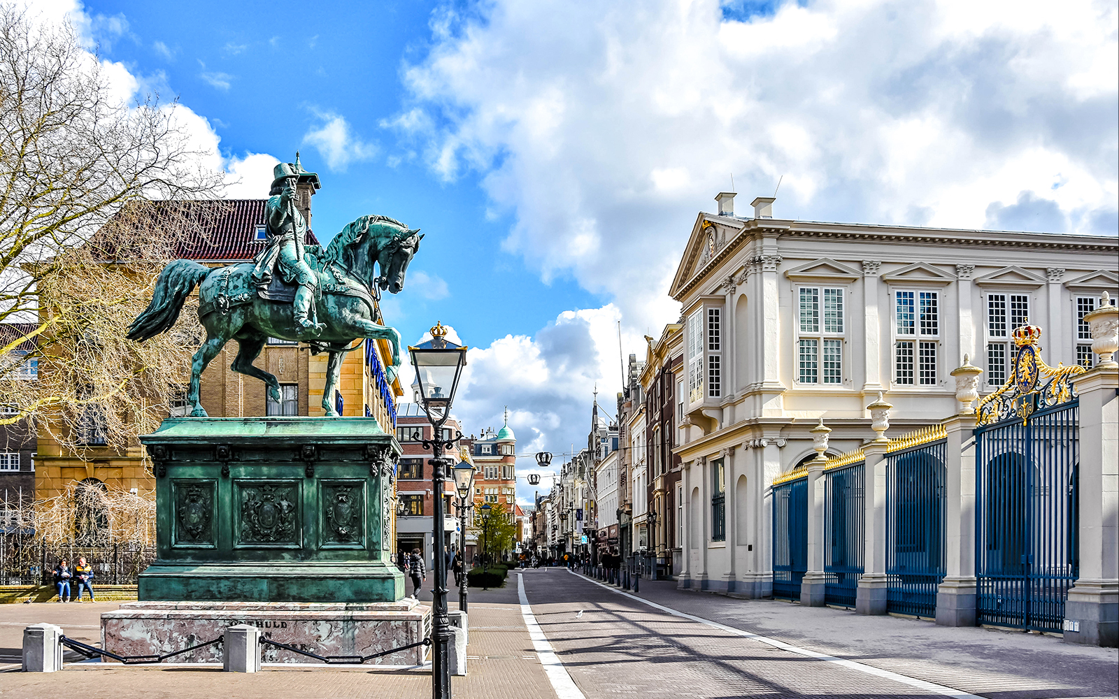 Equestrian statue and historic buildings on Noordeinde street, City Center, the Netherlands.
