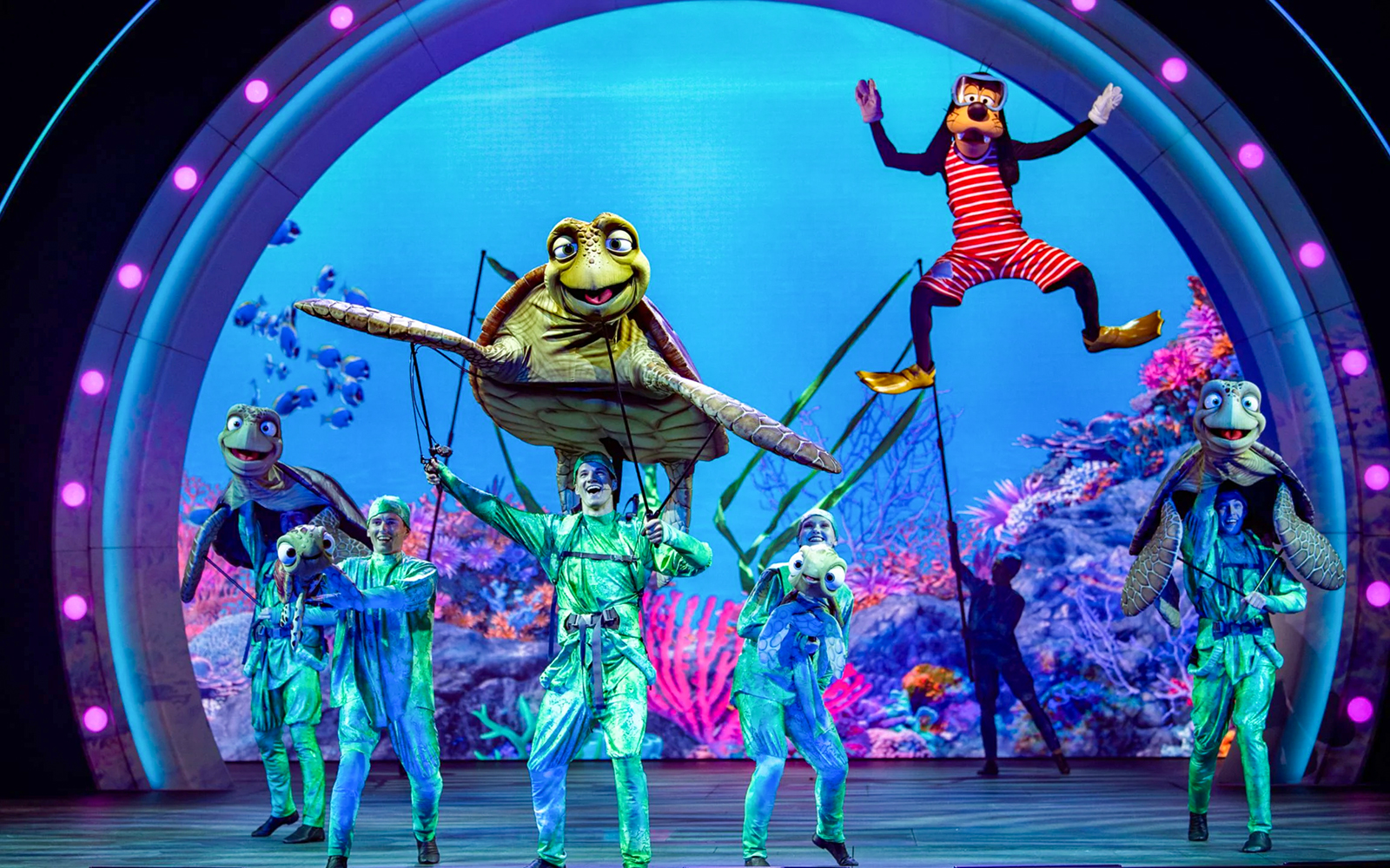 Live stage show with sea creature puppets on Disney Adventure Cruise from Singapore.