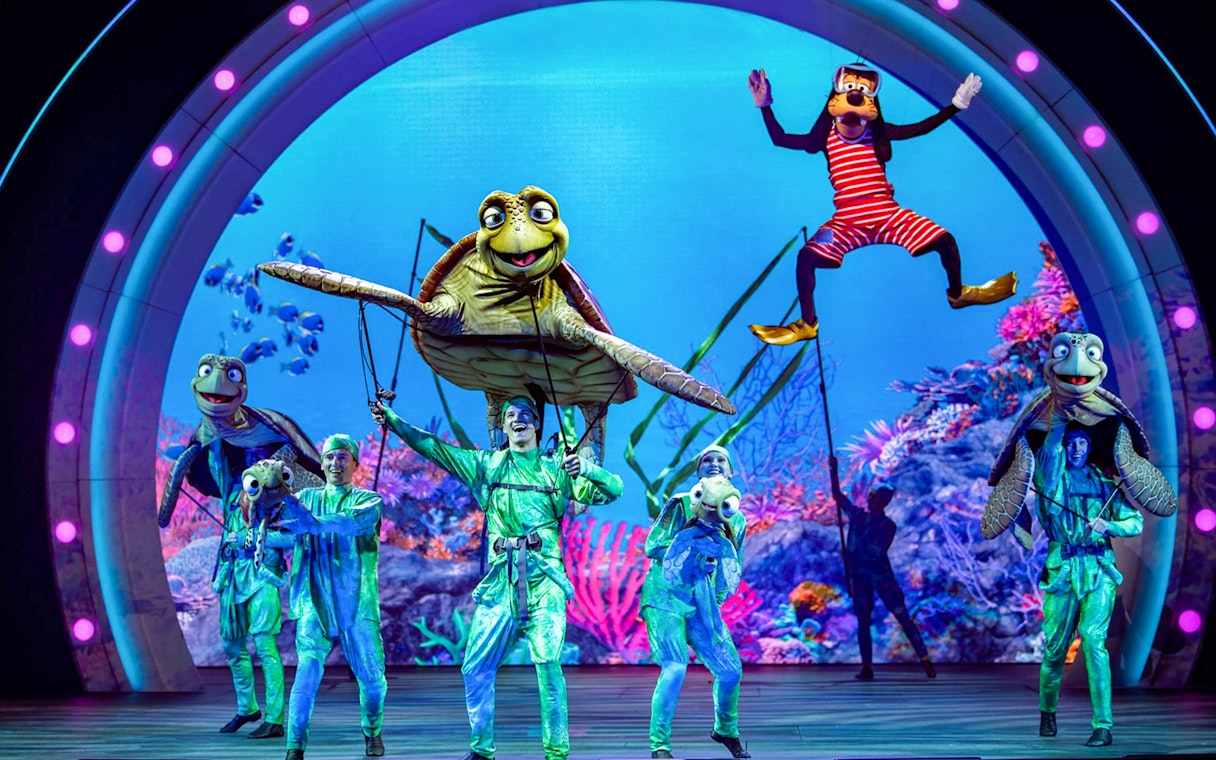 Live stage show with sea creature puppets on Disney Adventure Cruise from Singapore.